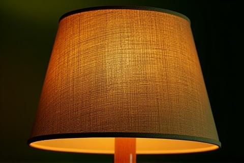 Lamp shade made from a textured, pigment-inspired fabric with rich color