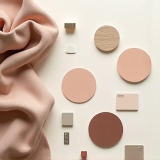 Artistically arranged color palette with paint chips and fabric swatches.